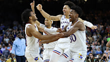 The Kansas Jayhawks celebrate after defeating the North Carolina Tar Heels 72-69 during the 2022 NCAA Men's Basketball Tournament National Championship at Caesars Superdome.