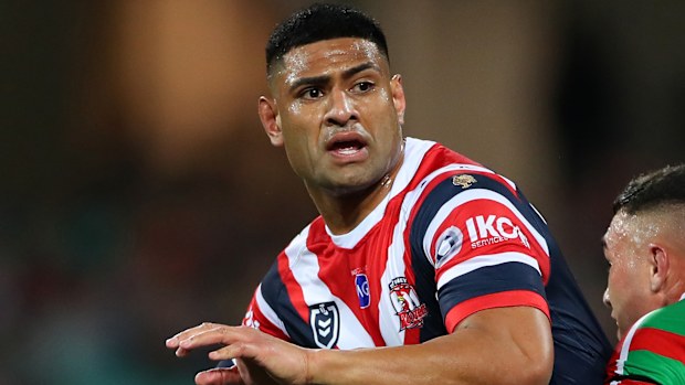 Daniel Tupou tries to break through a tackle against the Rabbitohs.