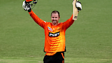 The Scorchers' Colin Munro celebrates scoring his maiden BBL century.