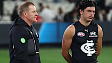 Carlton coach Michael Voss with Elijah Hollands after the loss to Collingwood.