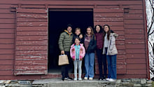  Paul Sheavils and his family of six save money by house swapping, including to New Zealand.