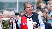 1966 Premiership players Kevin 'Cowboy' Neale and Barry Breen bring out the 1966 Premiership cup in 2016.