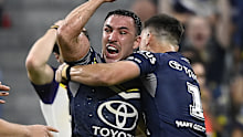 Reece Robson celebrates after scoring a try during the Cowboys' round 26 clash with the Storm.