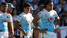 Titans players look on dejected. 