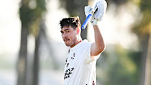 Matt Renshaw celebrates a century for Queensland. 
