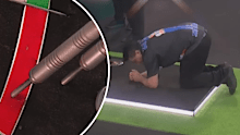 Joe Comito reacts after winning at the Darts World Championships