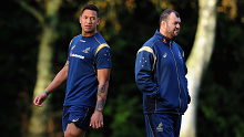 Israel Folau (left) and then-Wallabies coach Michael Cheika at a 2014 training session.