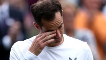 LONDON, ENGLAND - JULY 04: Andy Murray of Great Britain appears emotional following defeat in the Gentlemens Doubles first round match with Jamie Murray against Rinky Hijikata and John Peers of Australia during day four of The Championships Wimbledon 2024 at All England Lawn Tennis and Croquet Club on July 04, 2024 in London, England. (Photo by Clive Brunskill/Getty Images)