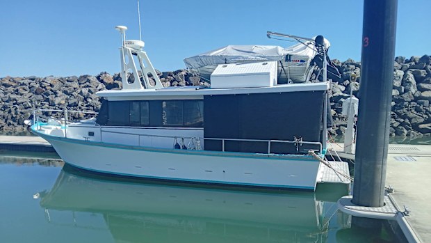 A Queensland couple were rescued by a fisherman after being stranded out at sea on paddleboards for three days.