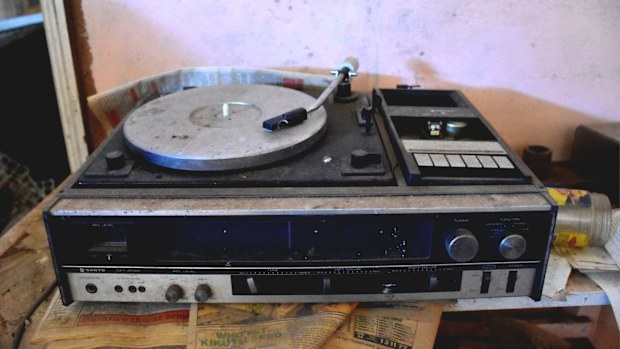 A record player found in one of the rooms.