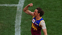 Joe Daniher of the Lions celebrates a goal during the AFL Grand Final match between Sydney Swans and Brisbane Lions at Melbourne Cricket Ground, on September 28, 2024, in Melbourne, Australia. (Photo by Morgan Hancock/AFL Photos/via Getty Images)