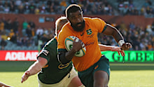 Marika Koroibete of the Wallabies makes a break to score a try during The Rugby Championship match between the Australian Wallabies and the South African Springboks