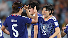 Remina Chiba celebrates with team mates.
