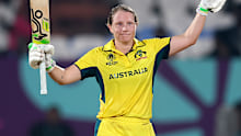 Australia captain Alyssa Healy celebrates hercentury that helped power Australia past Bangladesh at the ICC Women's Cricket World Cup.