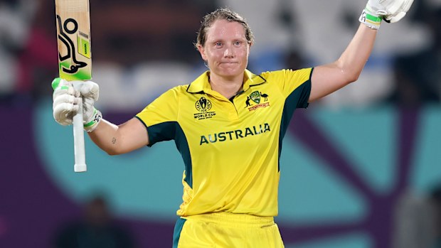 Australia captain Alyssa Healy celebrates hercentury that helped power Australia past Bangladesh at the ICC Women's Cricket World Cup.