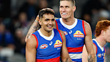 Jamarra Ugle-Hagan and teammate Rory Lobb.