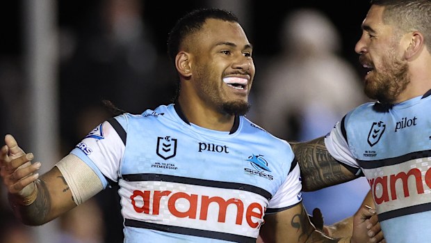 SYDNEY, AUSTRALIA - JUNE 12: Sione Katoa of the Sharks celebrates with team mates after scoring a try during the round 15 NRL match between the Cronulla Sharks and St George Illawarra Dragons at Sharks Stadium on June 12, 2025, in Sydney, Australia. (Photo by Cameron Spencer/Getty Images)