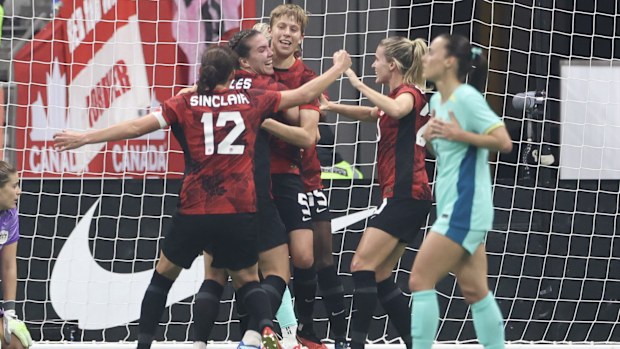 VANCOUVER, BRITISH COLUMBIA - DECEMBER 05: Quinn #5 of Canada reacts with teammates after scoring a goal during the first half against Australia at BC Place on December 05, 2023 in Vancouver, British Columbia. (Photo by Craig Mitchelldyer/Getty Images for Football Australia)