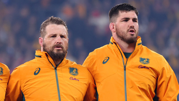 James Slipper and Liam Wright of the Wallabies sing the national anthem.