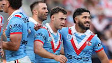 Sandon Smith celebrates with his Roosters teammates. 