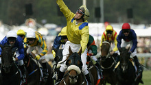 Oliver famously pointed to the heavens in memory of his brother Jason after crossing the finish line