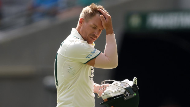 PERTH, AUSTRALIA - DECEMBER 16: David Warner of Australia looks dejected after being dismissed by Khurram Shahzad of Pakistan during day three of the Men's First Test match between Australia and Pakistan at Optus Stadium on December 16, 2023 in Perth, Australia (Photo by Paul Kane/Getty Images)