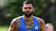 MELBOURNE, AUSTRALIA - NOVEMBER 17: Tarryn Thomas of the Kangaroos runs laps during a North Melbourne Kangaroos AFL training session at Arden Street Ground on November 17, 2023 in Melbourne, Australia. (Photo by Quinn Rooney/Getty Images)