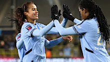 Khadija Shaw of Manchester City celebrates scoring with teammate Mary Fowler.