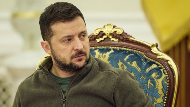 In this photo released by Ukrainian Presidential Press Office, Ukrainian President Volodymyr Zelenskyy leads a meeting of the National Security and Defense Council in Kyiv, Ukraine, Friday, Sept. 30, 2022. Ukraine's president says his country is submitting an "accelerated" application to join the NATO military alliance.