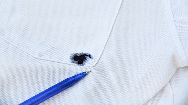 blue blue ink dirty stain  on white shirt for cleaning concept idea in work house