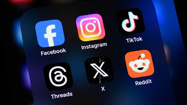 Toronto, Canada - August 22, 2024:    Popular social media apps on an Apple iPhone: Facebook, Instagram, TikTok, Threads, X (formerly Twitter), and Reddit.