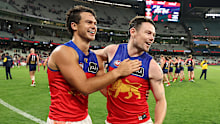 Lachie Neale and Cam Rayner post match.
