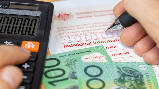 Tax return for individual. Australia tax settlement. Financial and business concept. Calculation and manual filling of the form. close up