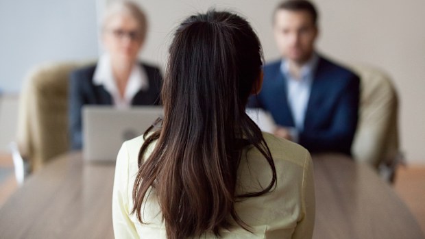 Businesswoman and businessman HR manager interviewing woman. Job interview.