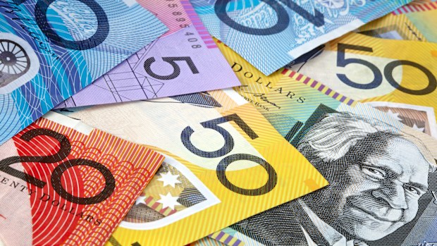 Australian money, in full-frame.  Fifty, twenty, ten and five dollar notes.