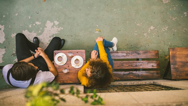 High angle view photography of Two Young people at the Cafe, Drinking Espresso couple date
