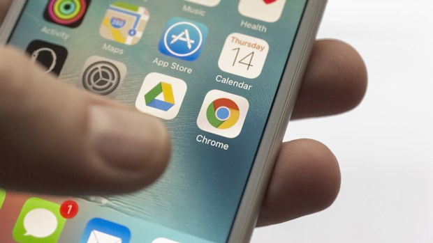 Istanbul, Turkey - January 14, 2016: Person holding a brand new Apple iPhone 6s with Chrome app on the screen. Chrome is a web browser service, launched in September 2008.