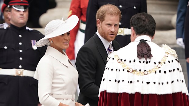 Prince Harry and Meghan, Duchess of Sussex arrive for the the National Service of Thanksgiving held at St Paul's Cathedral as part of celebrations marking the Platinum Jubilee of Britain's Queen Elizabeth II, in London, Friday, June 3, 2022. (Aaron Chown/Pool photo via AP)