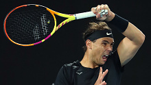 Rafael Nadal of Spain plays a forehand in his match against Emil Ruusuvuori of Finland.
