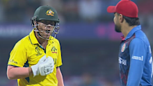 David Warner and Rashid Khan exchanged words early in Australia's innings. 