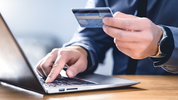 An alleged online scammer has been charged by Victoria police after evading authorities for over ten years.