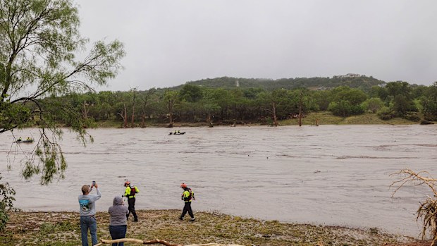 A Texas DPS helicopter conducts arial searches along the Guadalupe River in Kerrville on July 4.