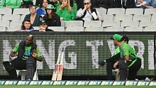Andre Russell sits alone during the Melbourne Stars innings.