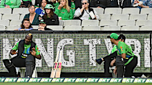 Andre Russell sits alone during the Melbourne Stars innings.