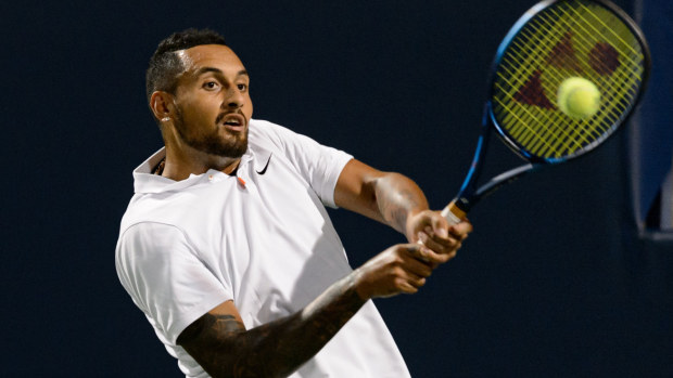 Nick Kyrgios returns the ball during the National Bank Open first round on August 9.