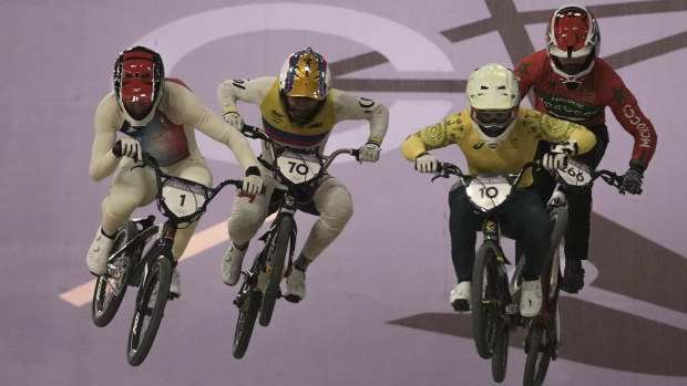 Izaac Kennedy (No.10) reached the men's BMX racing semi-final - all with a broken wrist.