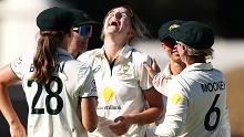 Annabel Sutherland of Australia celebrates with her team after taking the wicket of Chloe Tryon of South Africa during day three of the Women's Test Match between Australia and South Africa at WACA on February 17, 2024 in Perth, Australia. (Photo by Paul Kane/Getty Images)