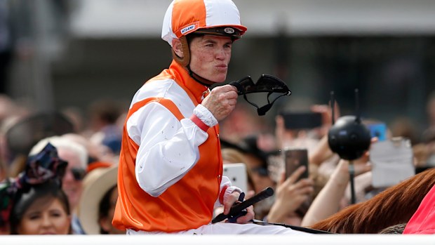Craig Williams celebrates atop Vow and Declare.