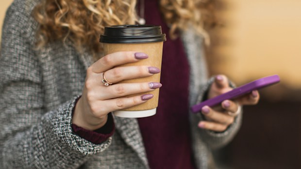 Mobile phone with takeaway coffee