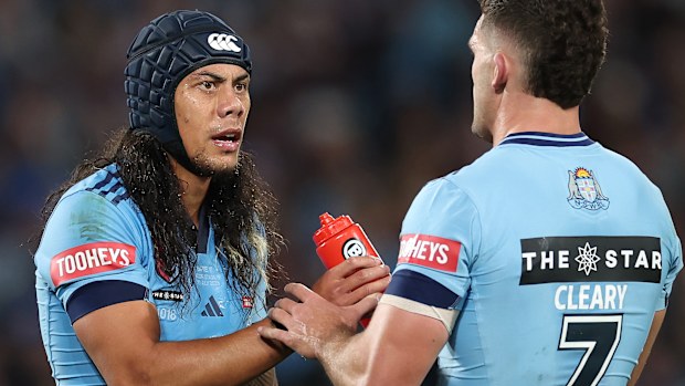 Jarome Luai and Nathan Cleary of the Blues talk during game three.
